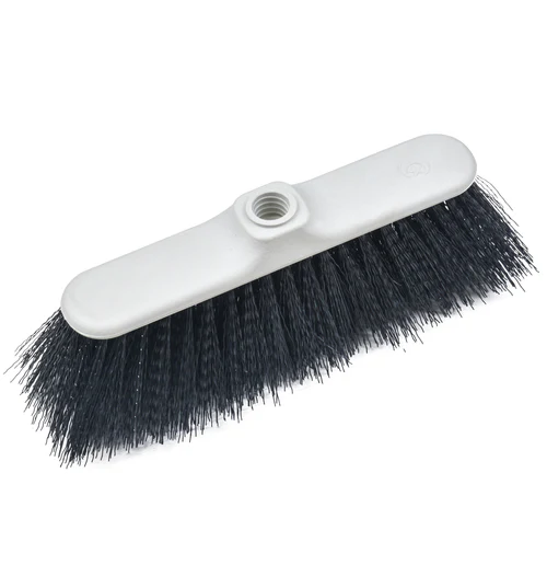 Small, curved, stiff-bristled brush